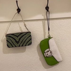 Two Green Coach Clutches